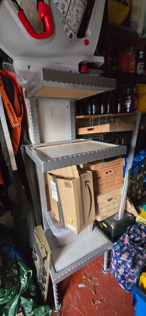 Shelving Unit - Kind that needs fixed to the wall but has legs