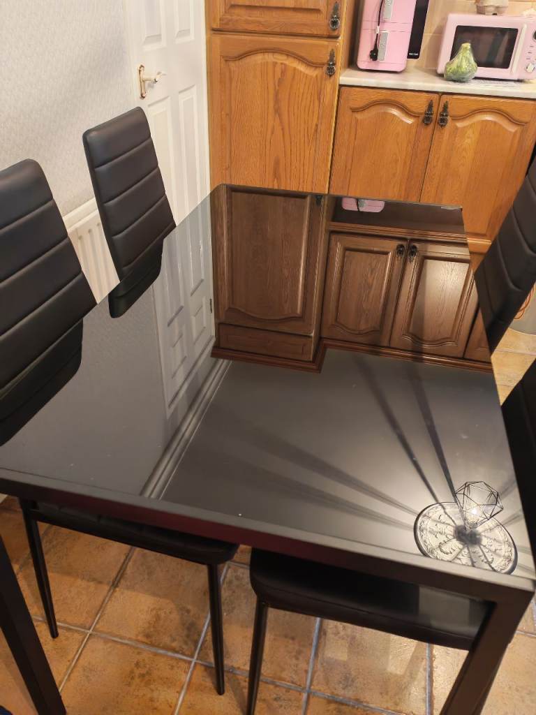 Black Glass Dining Table with 4 Chairs – Good Condition