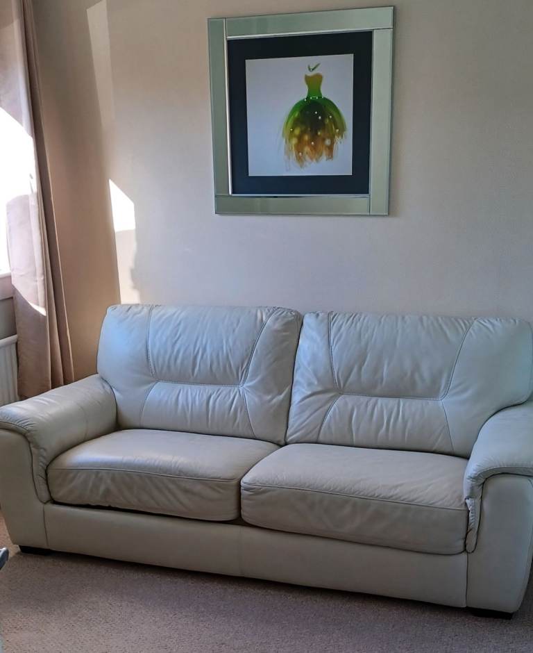 Off white leather three seater sofa bed with mattress 