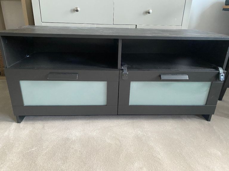 Black IKEA TV stand with two drawers