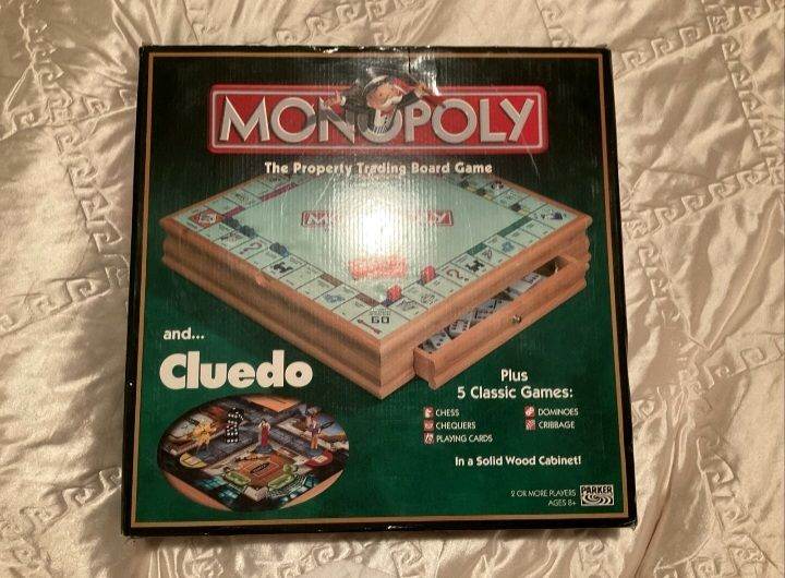 image for Monopoly and Cluedo Plus 5 Classic Games in a Wood Cabinet Board Game
