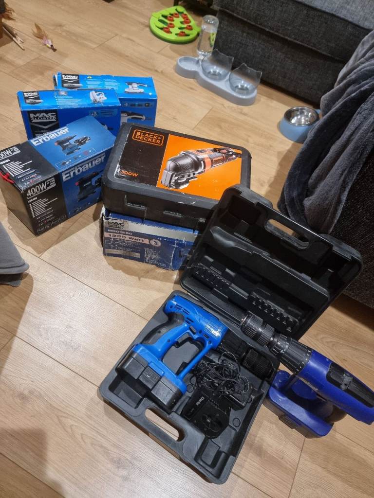 Various power tools - sander, router, multitool, jigsaw, combi drill
