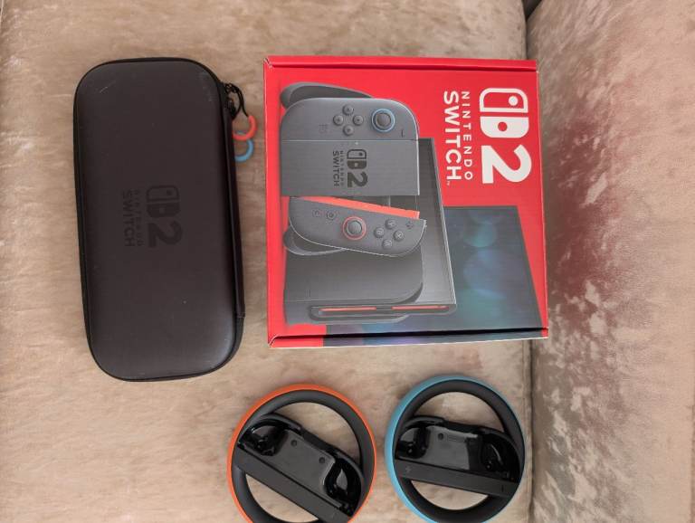 Nintendo Switch 2 with Case and Steering Wheels