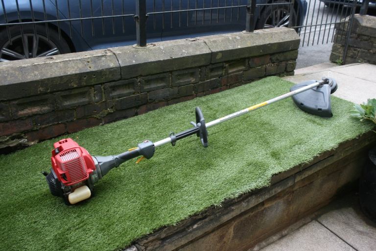 Honda four stroke petrol strimmer good condition, excellent working order