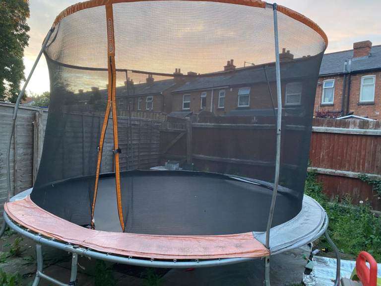 Large Outdoor Trampoline with Safety Net – Fair Condition