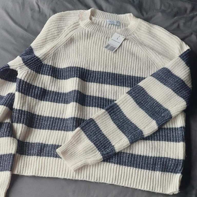 Blue and white stripey knit jumper