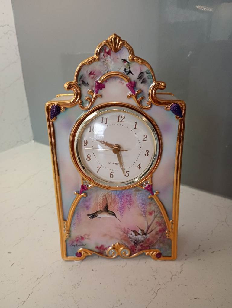 Price Reduction! Stunning and beautiful Heirloom Porcelain Clock-Garden Whispers by Larry Martin.