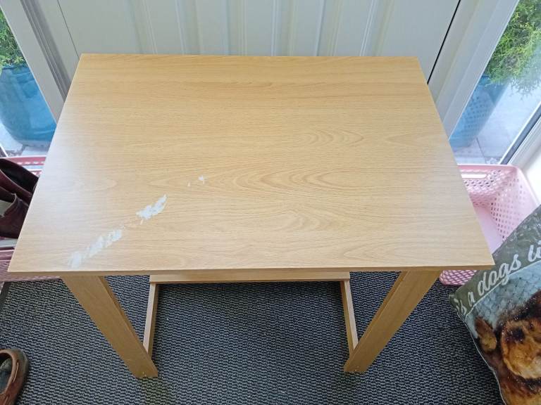 Light oak coloured desk.