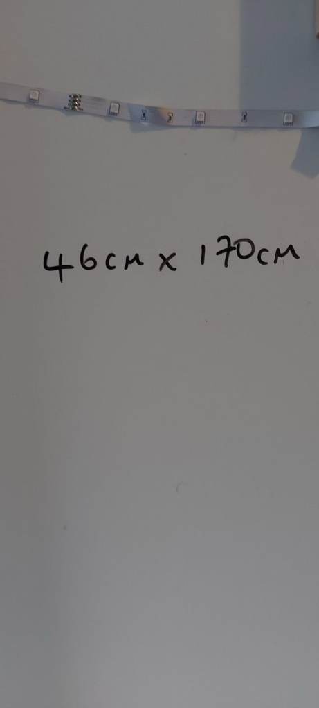 Desk length of white contiboard with metal legs