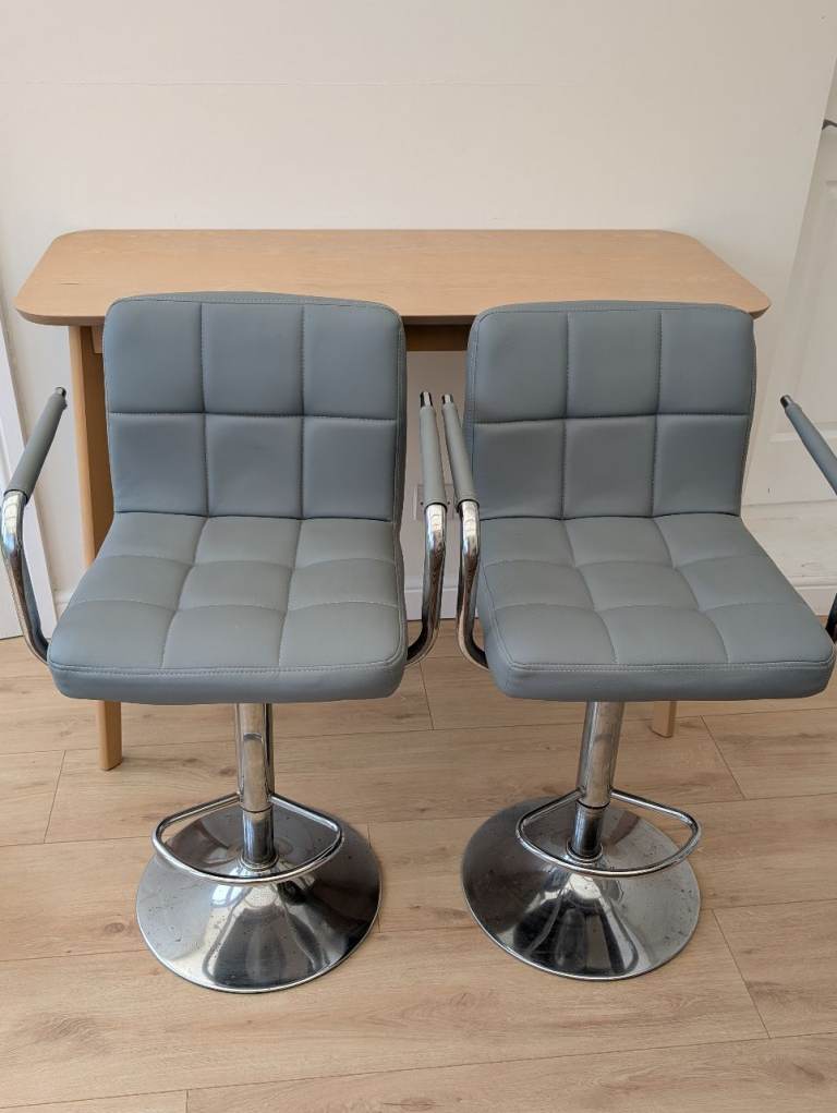 Pair of faux leather stools 