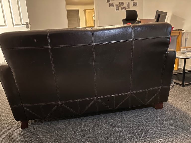 Brown 2 seater leather sofa 