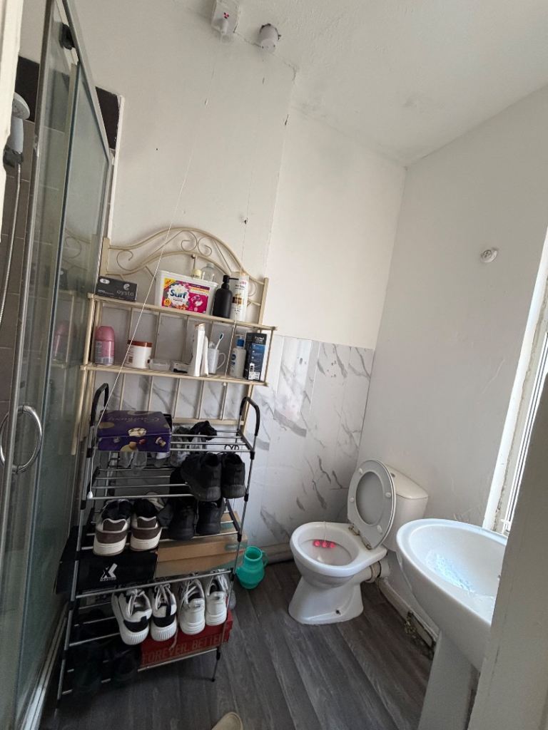 Box room with attached bathroom in house 