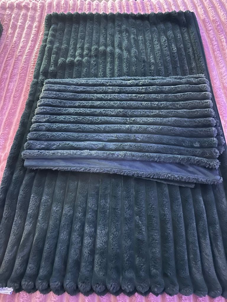 Throws, cushions, vase and tea light holders 