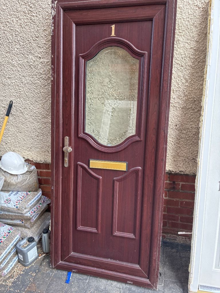 Rosewood upvc doo- white inside,  good condition 