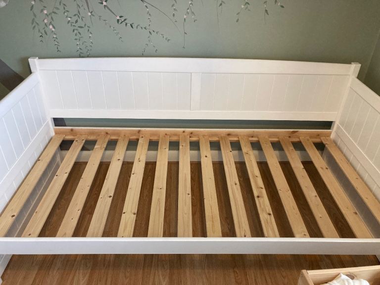 Single wooden day bed with drawers 