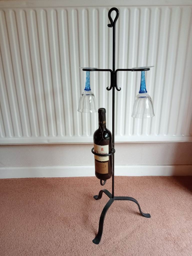 Black metal bottle and glass holder