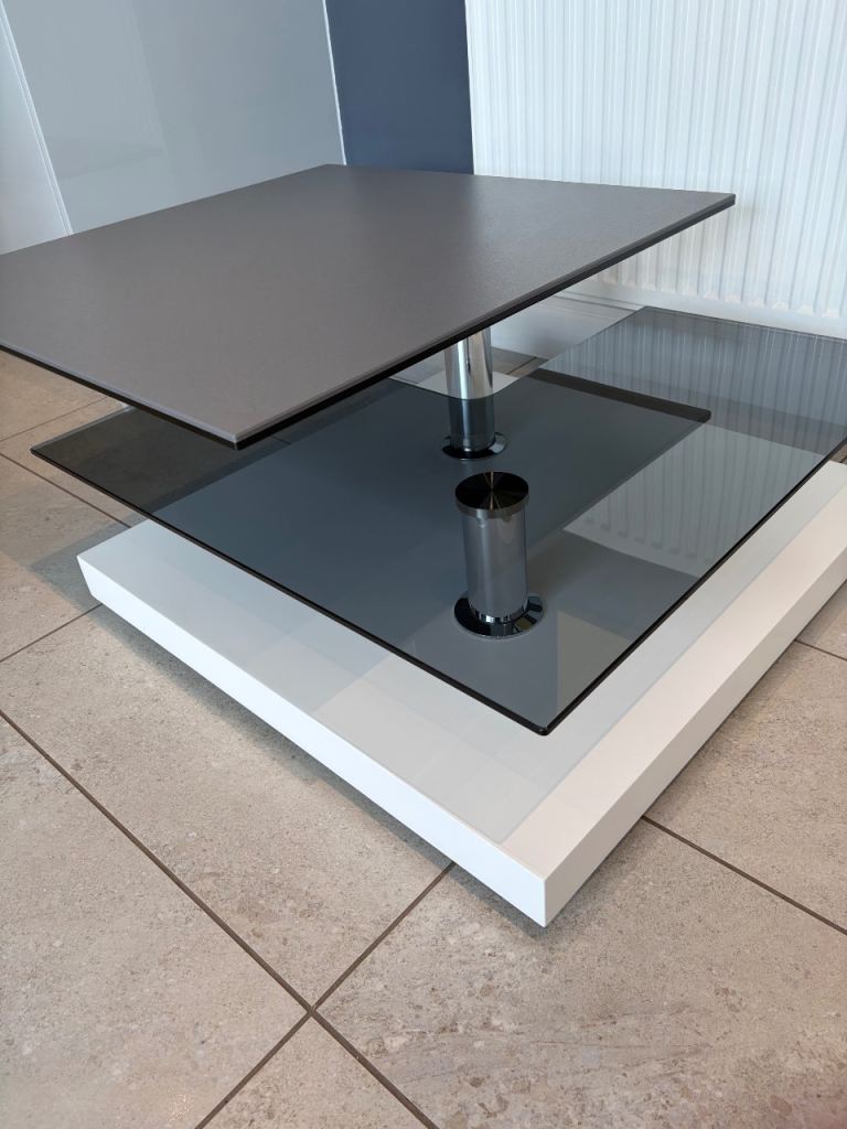 Designer Akante Sophia Grey Ceramic Glass Coffee Table with 360° Pivot. Pristine Condition.