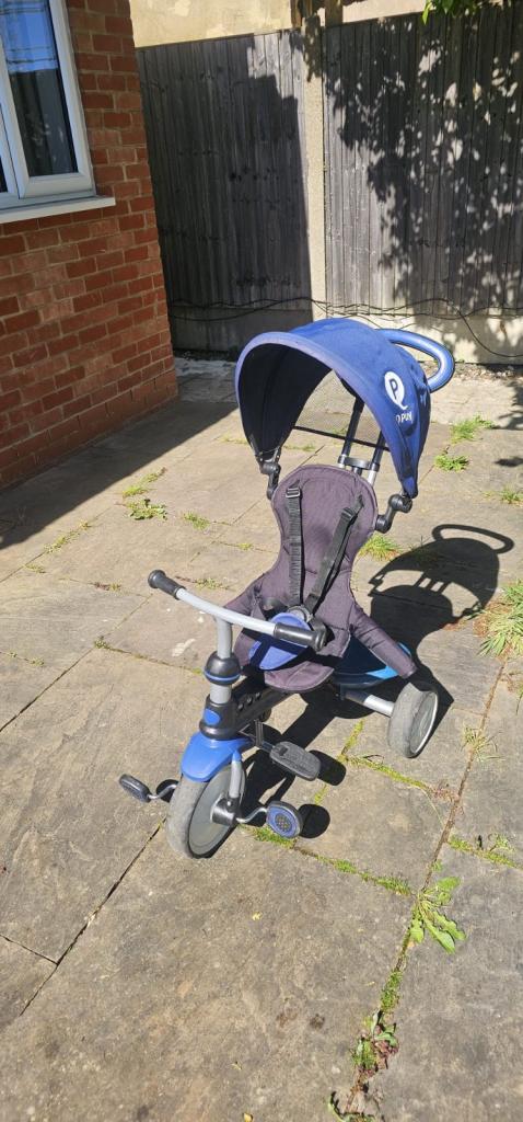 Blue tricycle with canopy