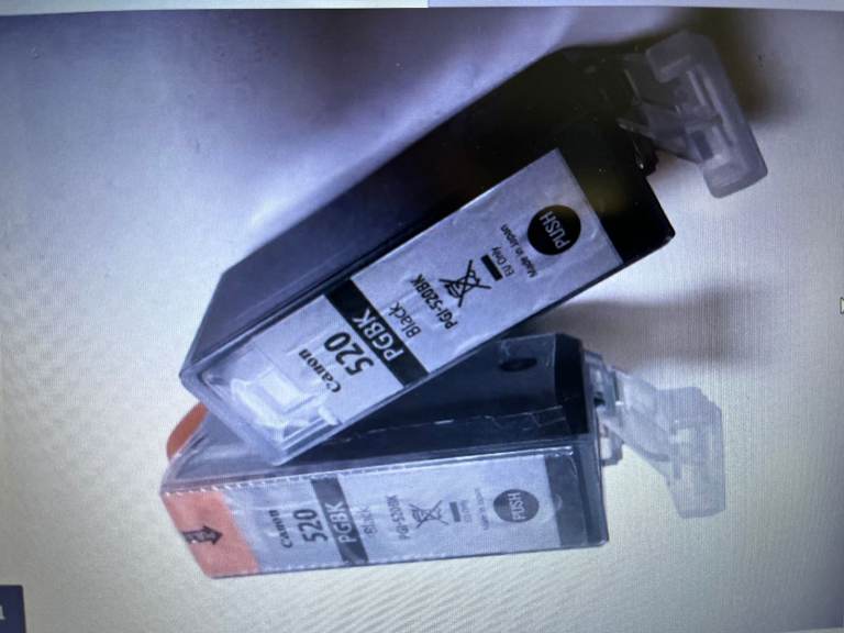 Canon 520pgbk PGI 520bk twin pack black cartridge(both UNUSED, but 1 opened(but taped up)). RRP £20