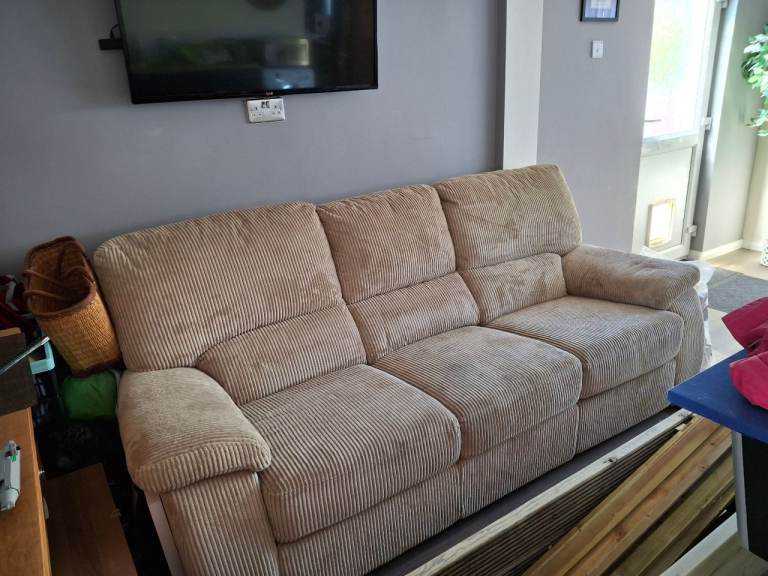 Comfy Three-Seater Beige Fabric Sofa - Good Condition