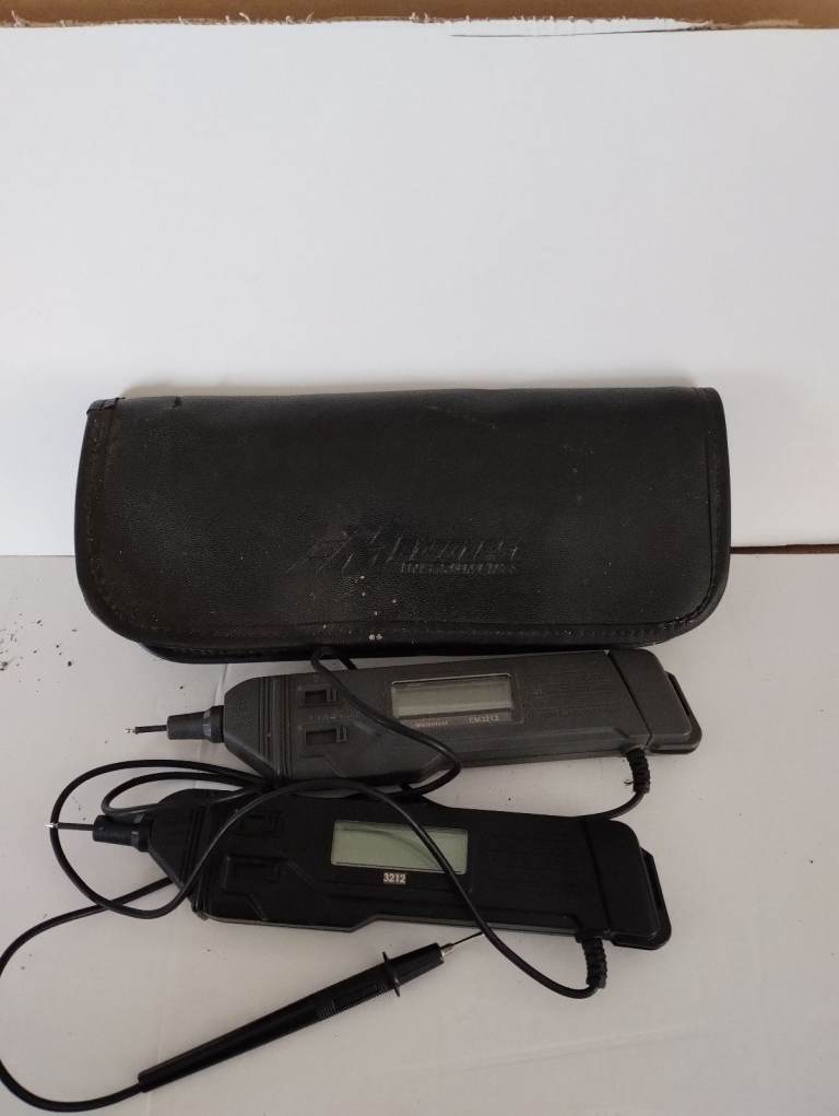 Two electrical testers in a case