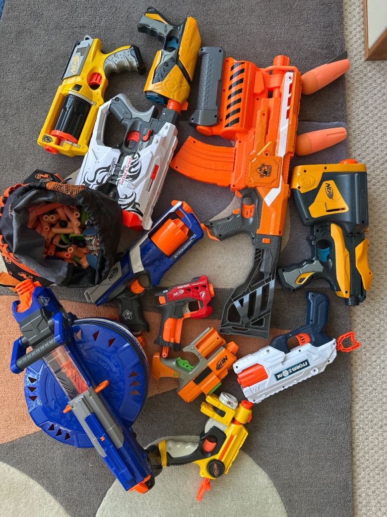 Large bundle of Nerf guns with bullets