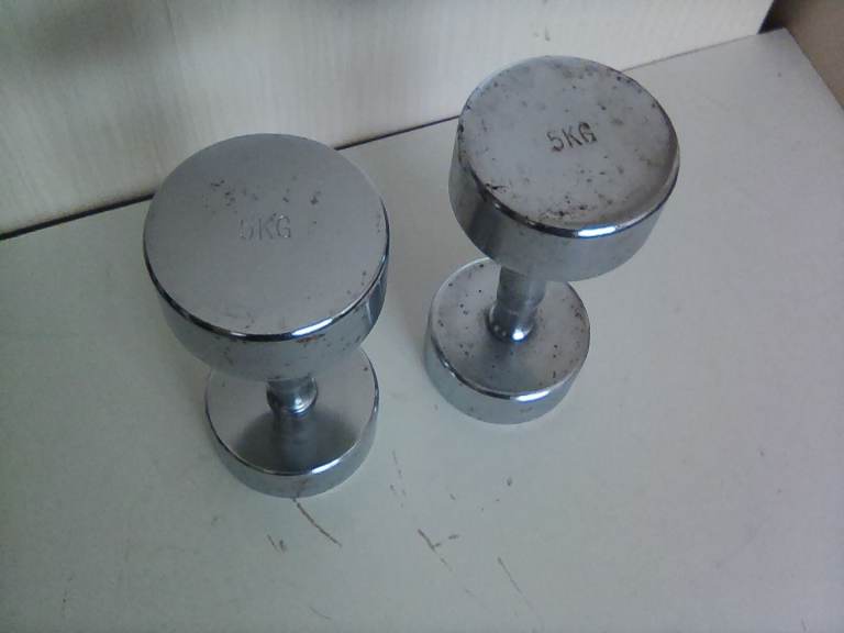 Pair chrome finished 5 KG. dumbbells.