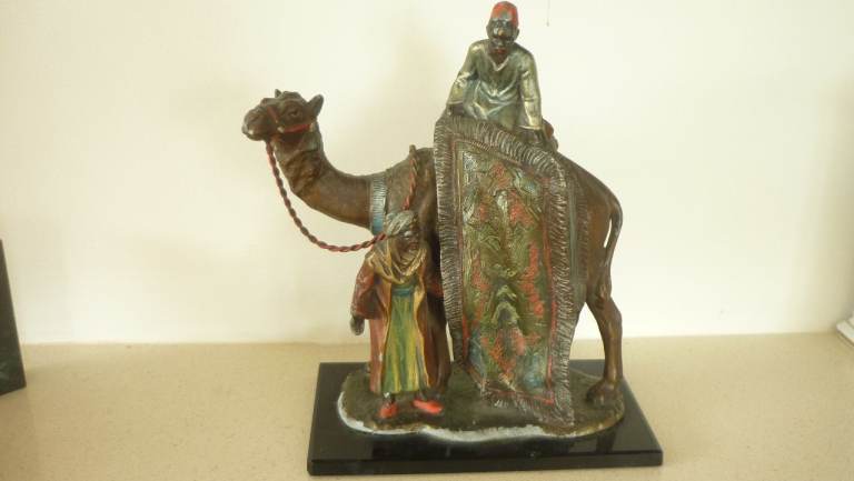 Vintage spelter model of carpet seller on camel 