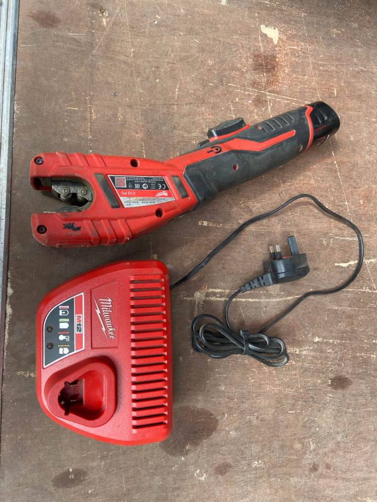 Milwaukee Pipe Cutter & Charger – Good Condition