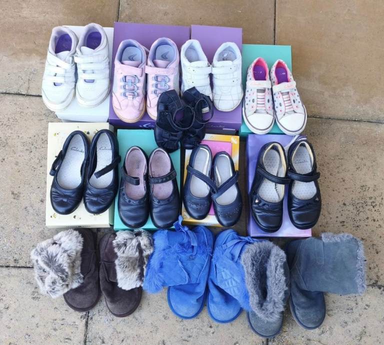 Bundle of girls shoes of various sizes 
