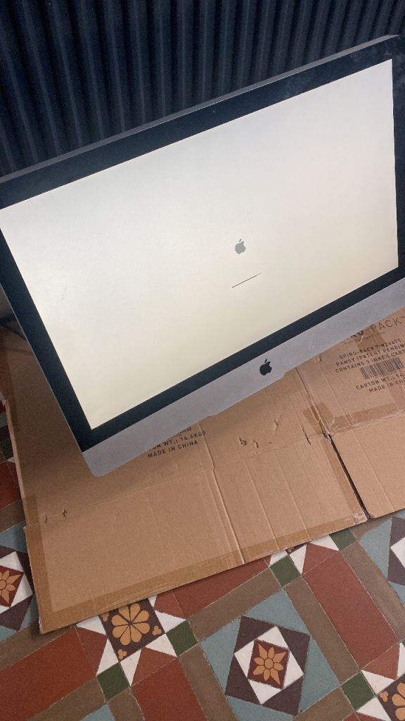Apple Computer model A1312 Stuck On Loadjng Screen