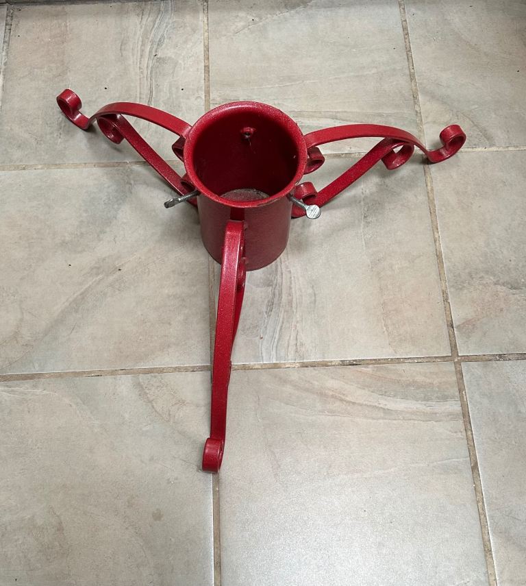 Christmas tree holder,metal painted on red. 70cm width, 20cm height