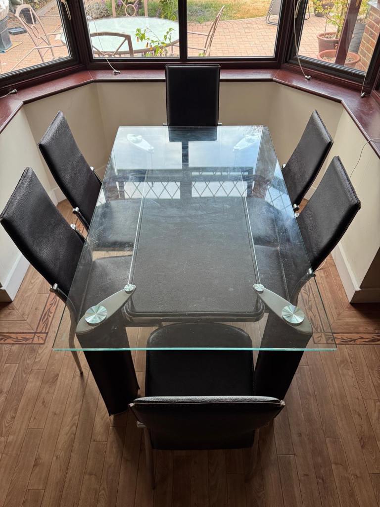 Glass table with chairs
