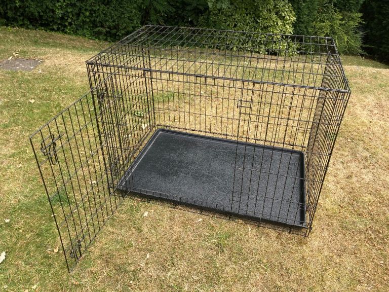 Large dog crate/ cage 43 x 28 x 31 “  RRP £80 Side and front doors for easy positioning . 