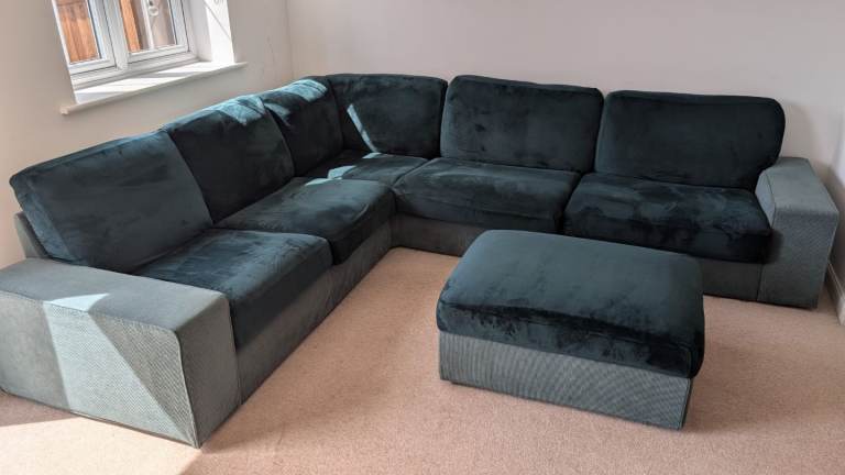 Corner sofa with footstool