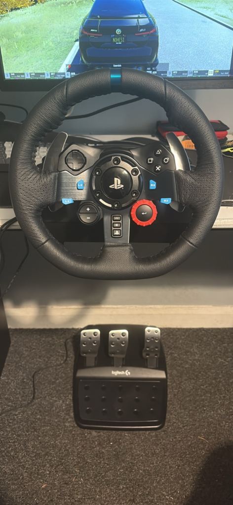 Logitech G29 Racing Wheel & Pedals for PS4/PS5 – Good Condition