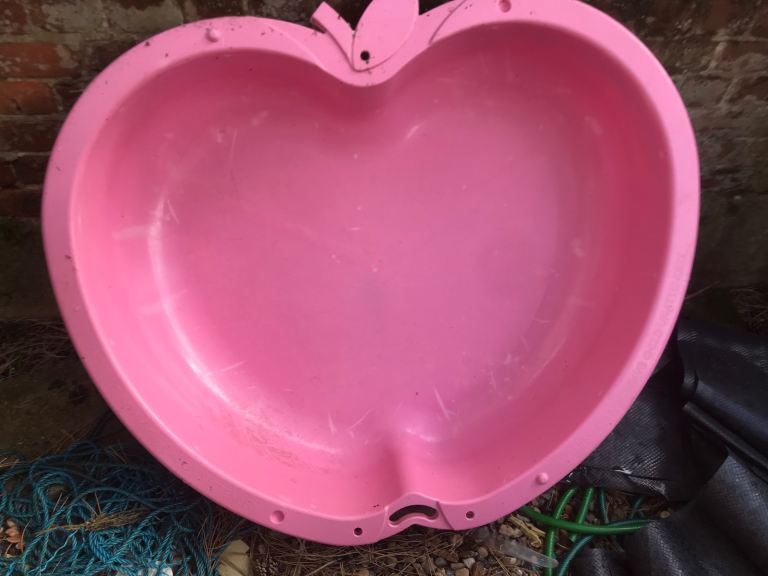 Pink shell sand/water pit