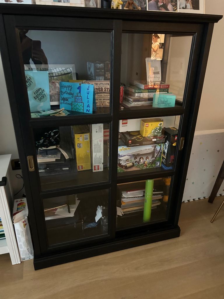 Black Wooden Display Cabinet with Glass Sliding Doors – Good Condition