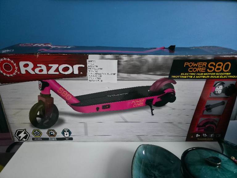 Childs electric scooter