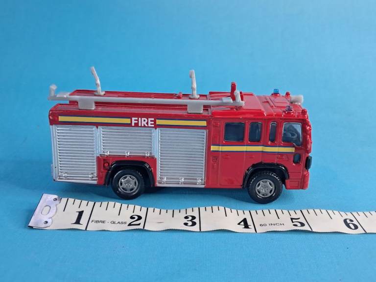 This is a London Fire Truck diecast model toy car,  produced by Motormax or Corgi. 