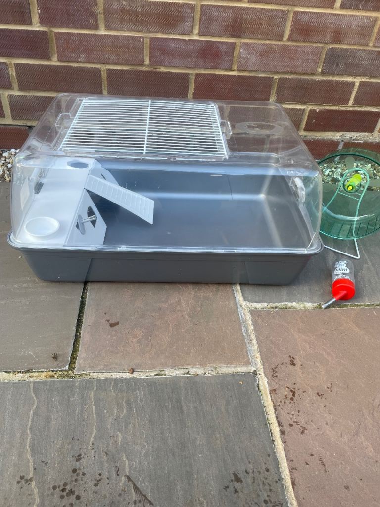 Hamster cage,  wheel and bottle