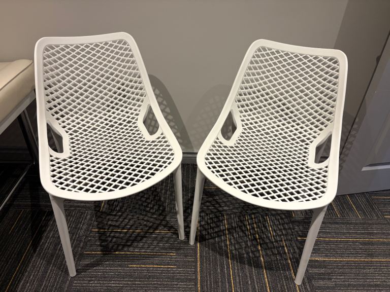 2 white ikea chairs 