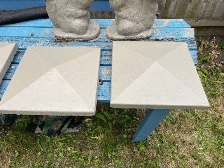 Concrete pyramid pillar heads.
