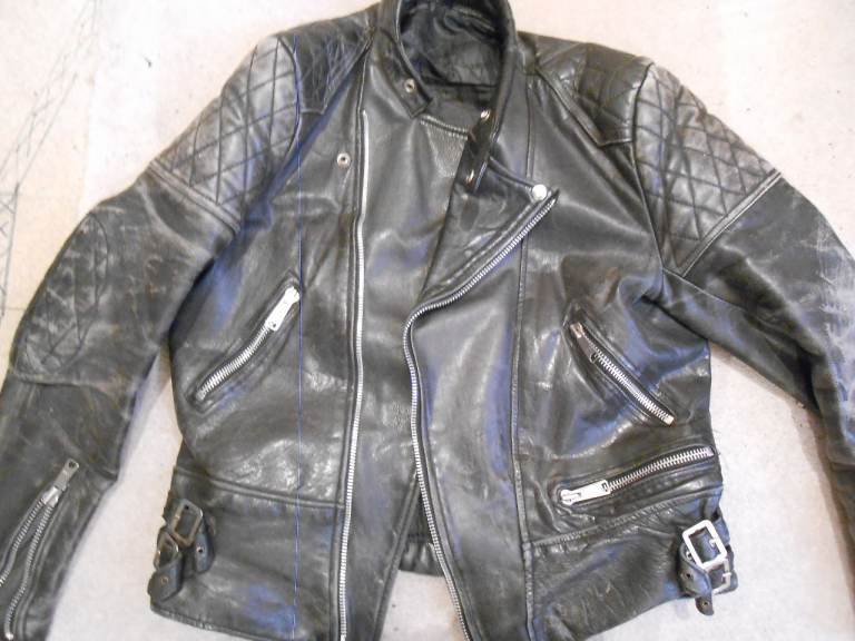 40 YEAR OLD LEATHER BIKERS JACKET.