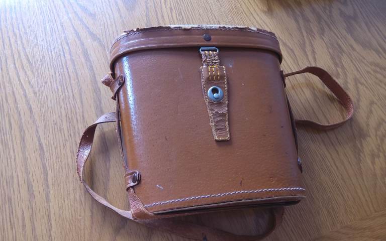 Binoculars in leather case 