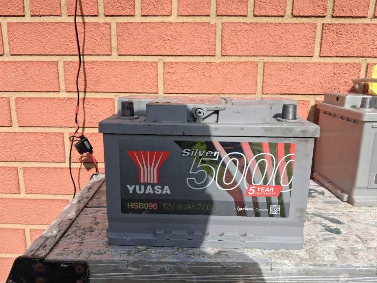 Fully charged yuasa car battery