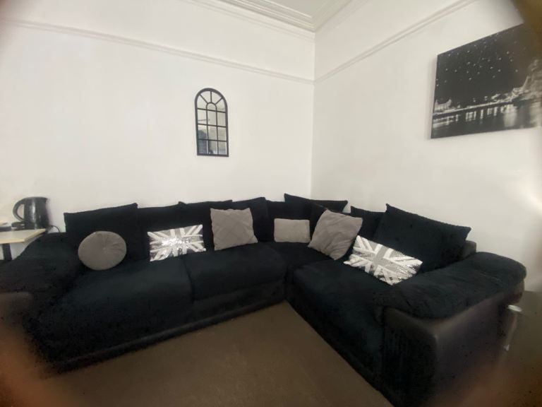 Black corner couch 