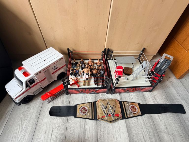 Large WWE Wrestling Bundle – 2 Rings, Figures, Belt, Slamambulance & Forklift