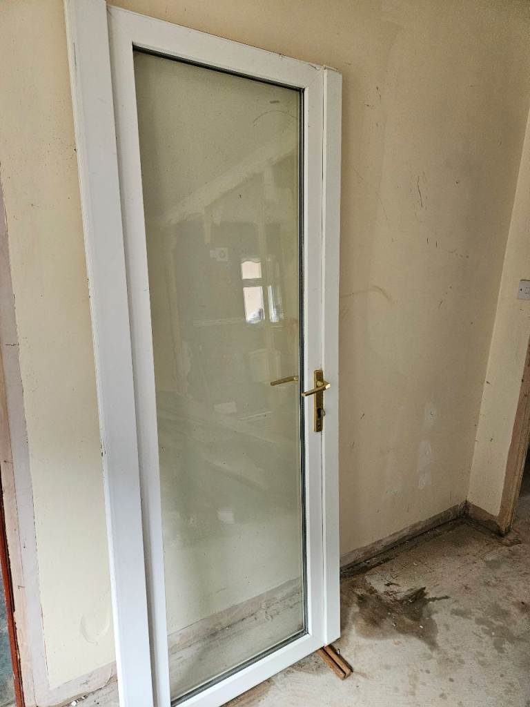 White UPVC Glazed Door with Brass Handle – Good Condition