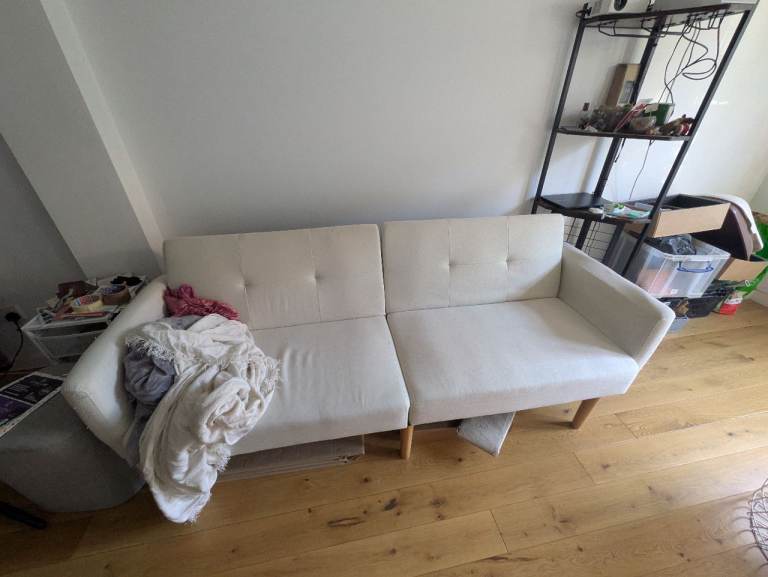 3 seater Beige sofa bed